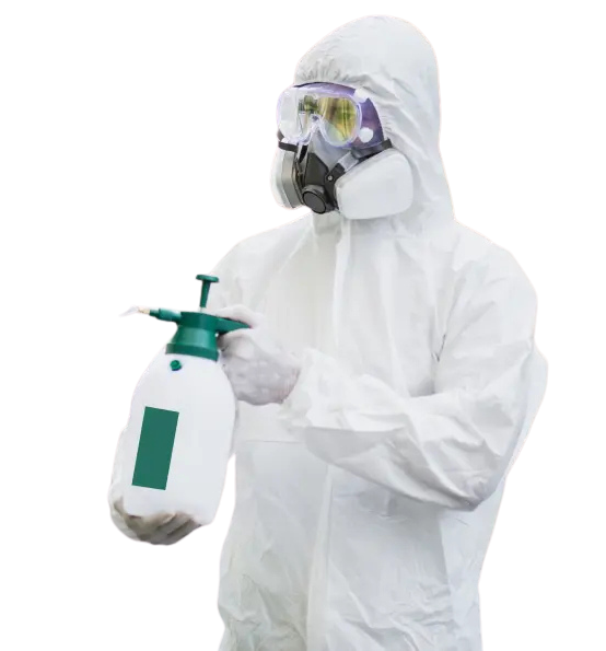 disinfection specialist in ppe suit performing edited